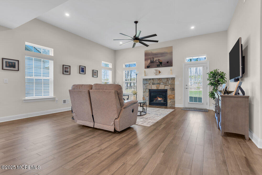 65 Moonlight Drive Barnegat, NJ 08005 - Photo 21 of 68 a living room with furniture fireplace and flat screen tv