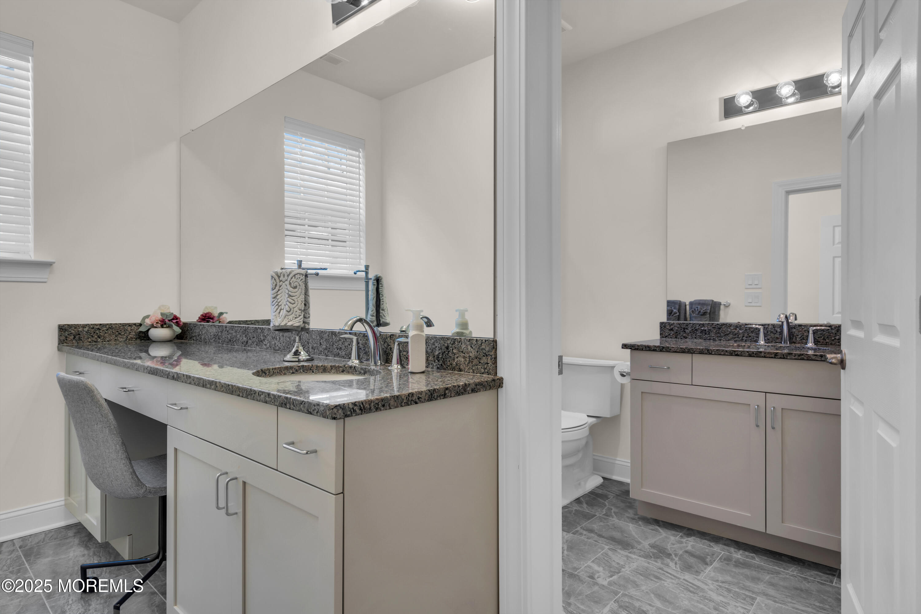 65 Moonlight Drive Barnegat, NJ 08005 - Photo 27 of 68 a bathroom with a granite countertop sink a toilet and a mirror