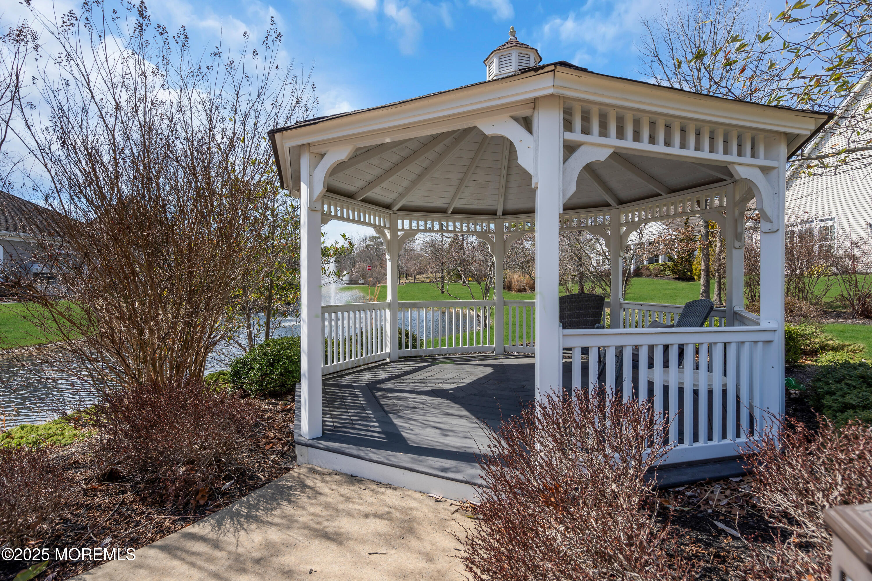 65 Moonlight Drive Barnegat, NJ 08005 - Photo 54 of 68 a view of a chair and table in the patio