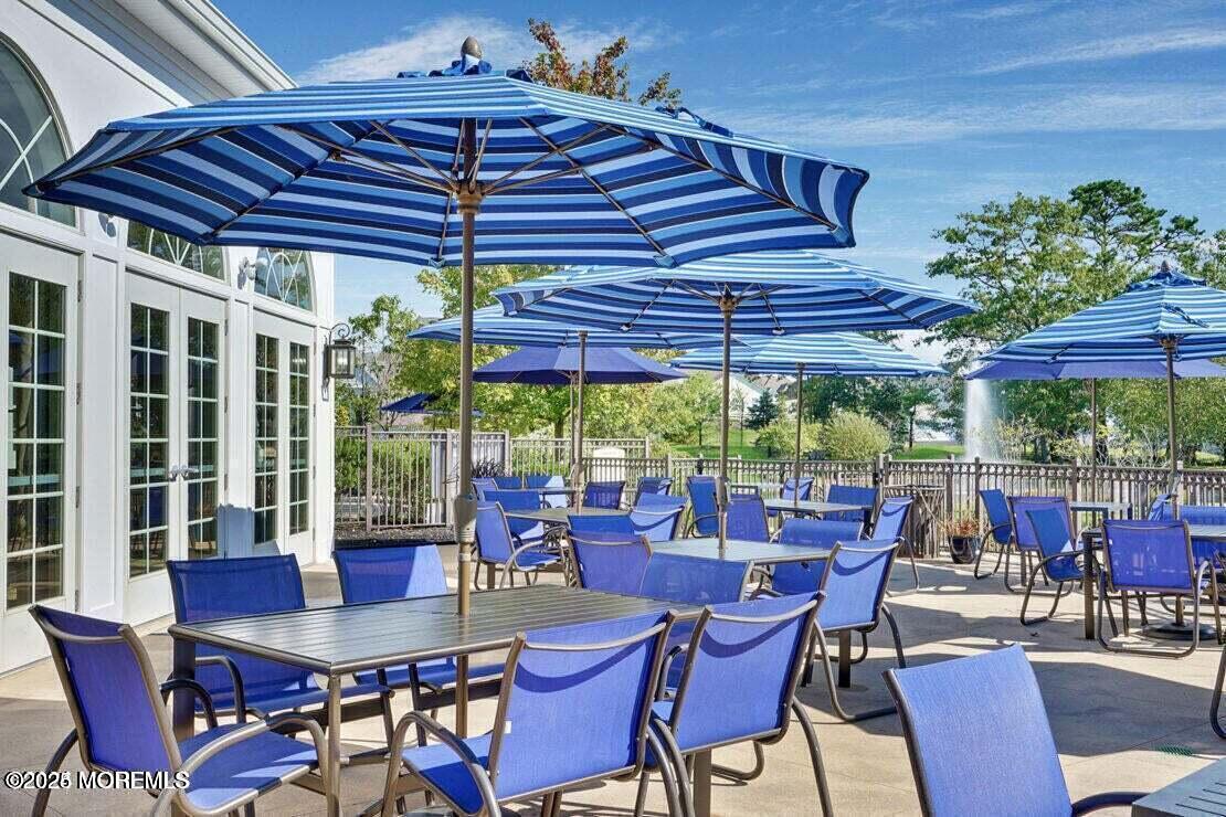 65 Moonlight Drive Barnegat, NJ 08005 - Photo 59 of 68 a view of a dining room with furniture window and outside view