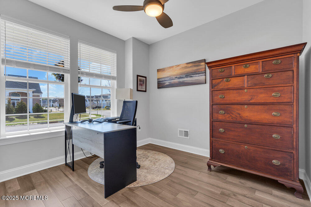 65 Moonlight Drive Barnegat, NJ 08005 - Photo 10 of 68 a view of a workspace with furniture and a window