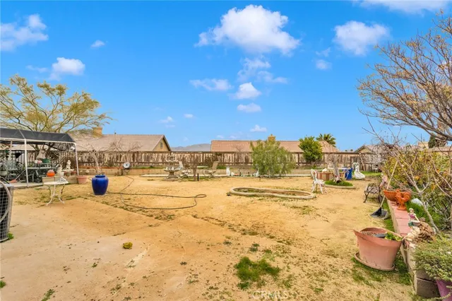 a view of a swimming pool with a lounge chairs