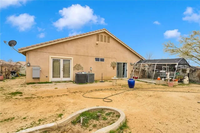 a view of a house with snow on the ground