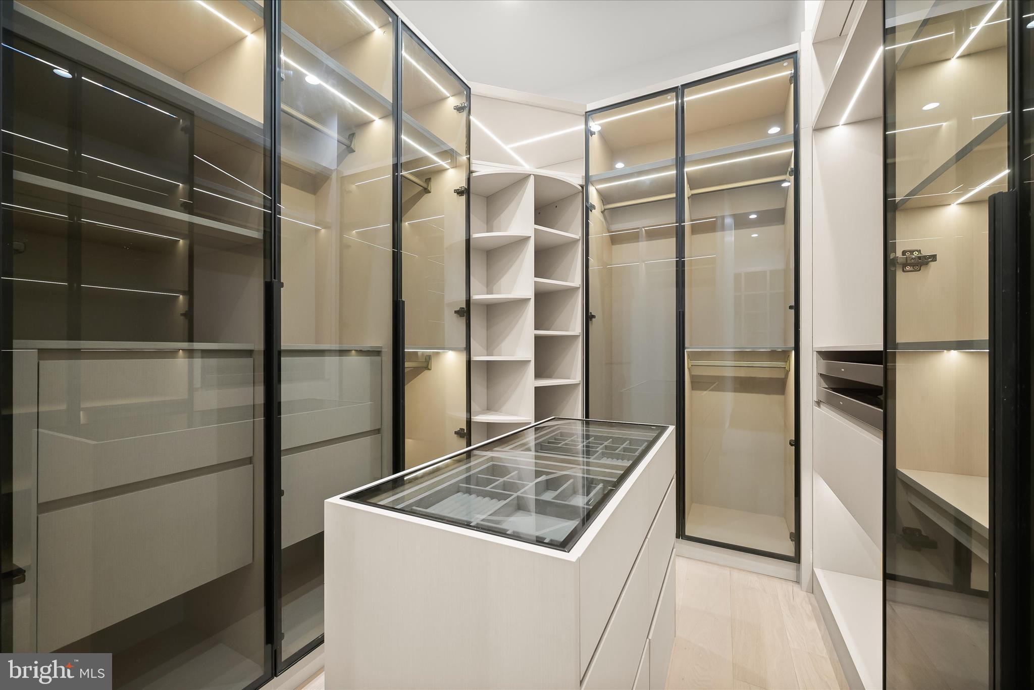 4509 Foxhall Crescent Northwest Washington, DC 20007 - Photo 18 of 39 a kitchen with a refrigerator and a stove top oven