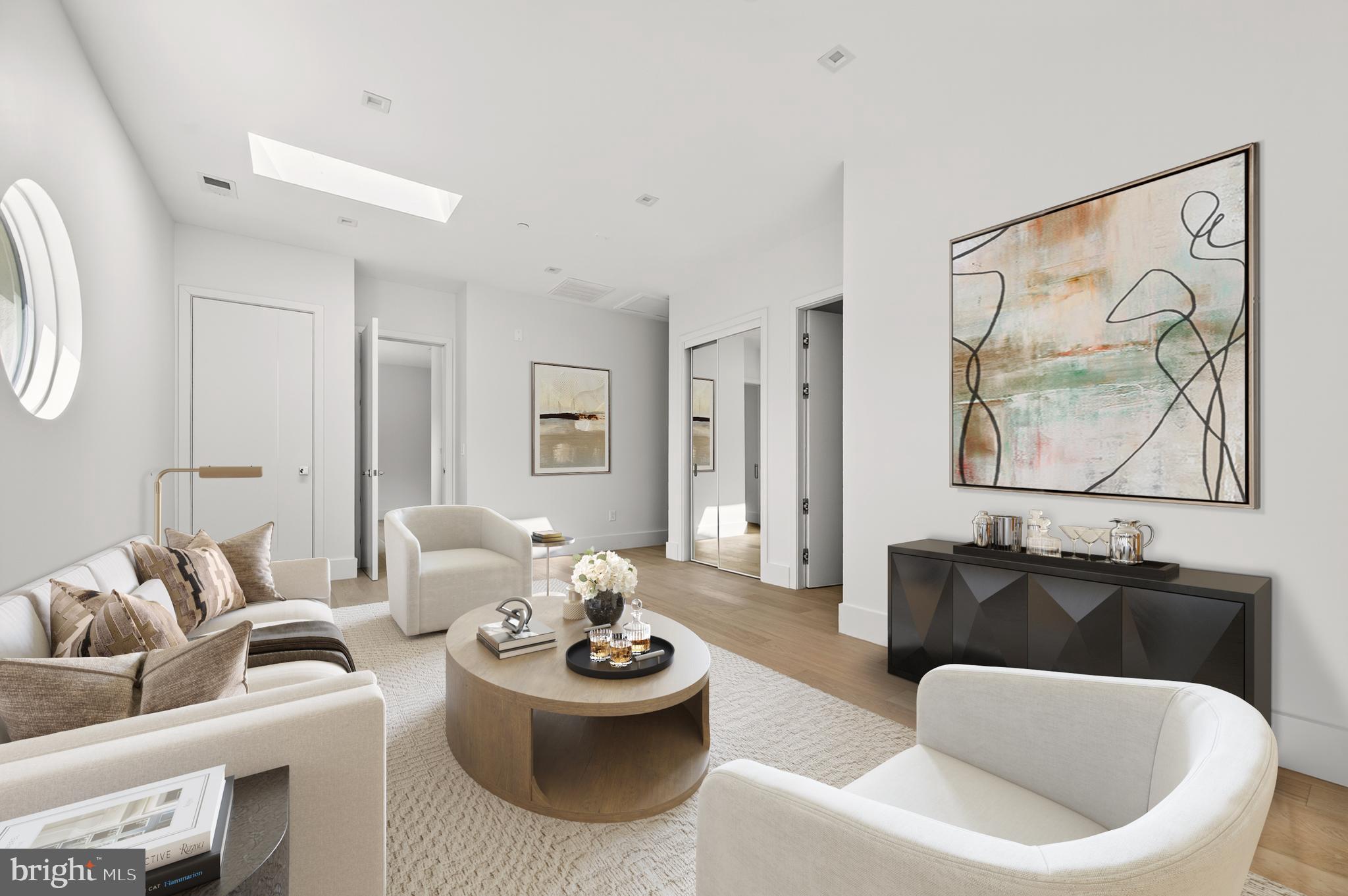 4509 Foxhall Crescent Northwest Washington, DC 20007 - Photo 21 of 39 a living room with furniture and a large window