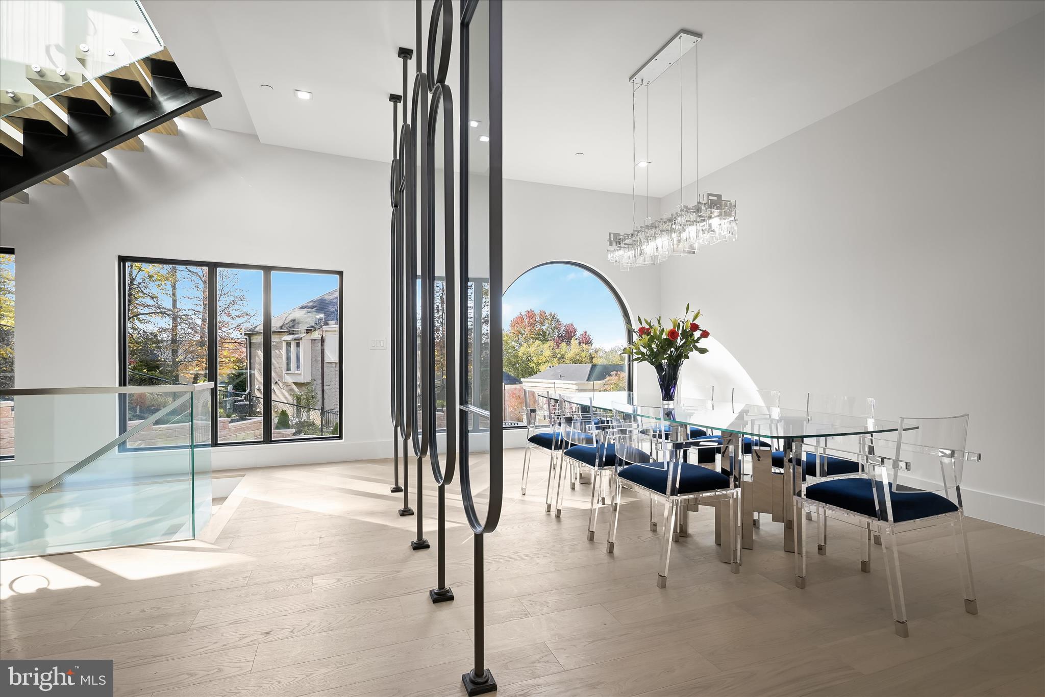 4509 Foxhall Crescent Northwest Washington, DC 20007 - Photo 30 of 39 a view of a dining room with furniture and chandelier