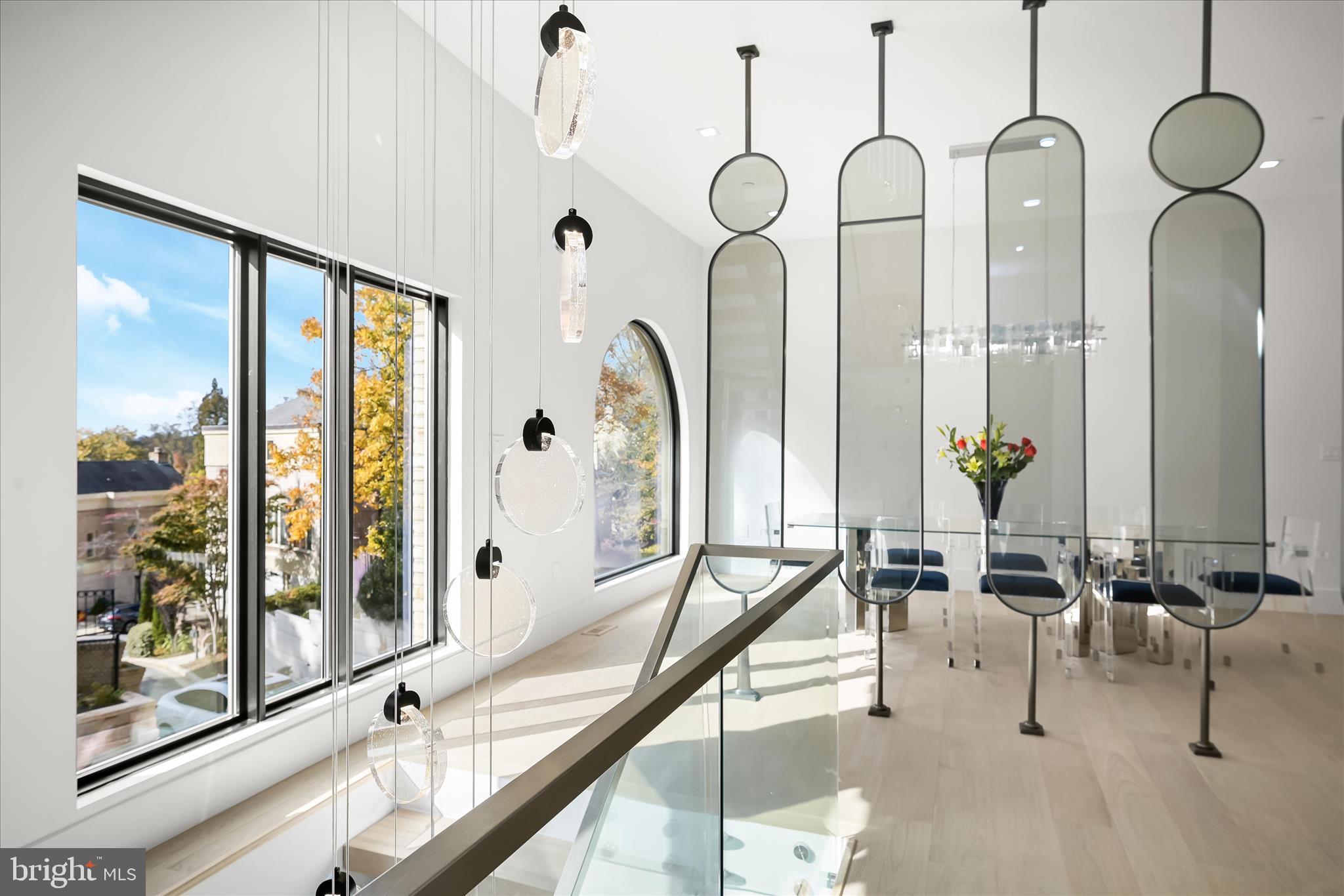 4509 Foxhall Crescent Northwest Washington, DC 20007 - Photo 32 of 39 a very nice looking living room with a large windows and furniture