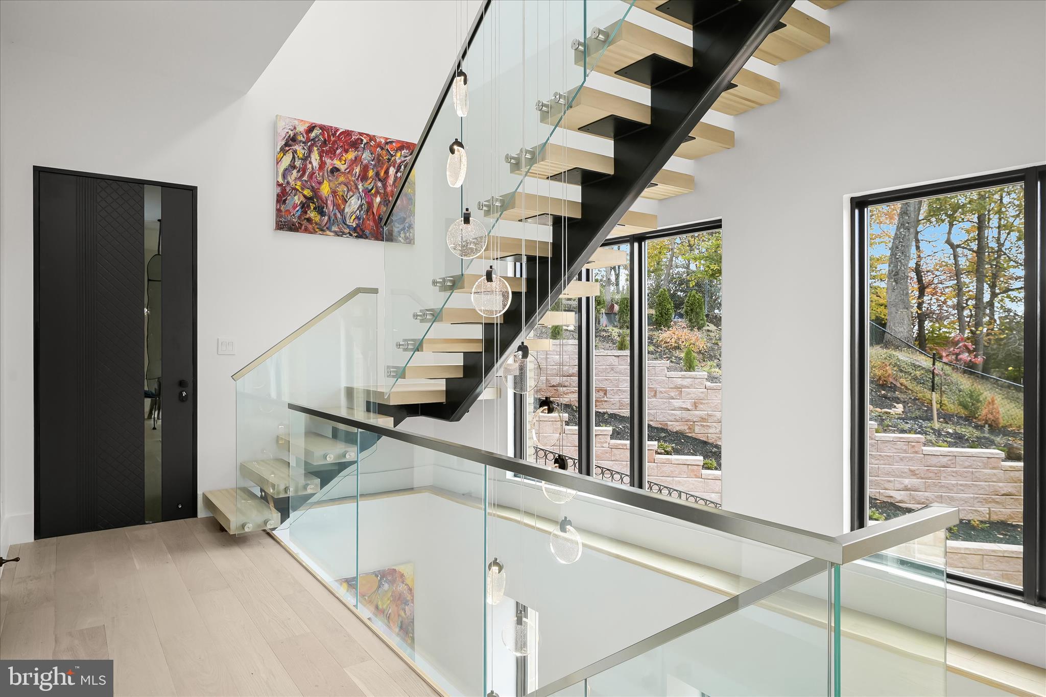 4509 Foxhall Crescent Northwest Washington, DC 20007 - Photo 33 of 39 a view of entryway and hall with wooden floor