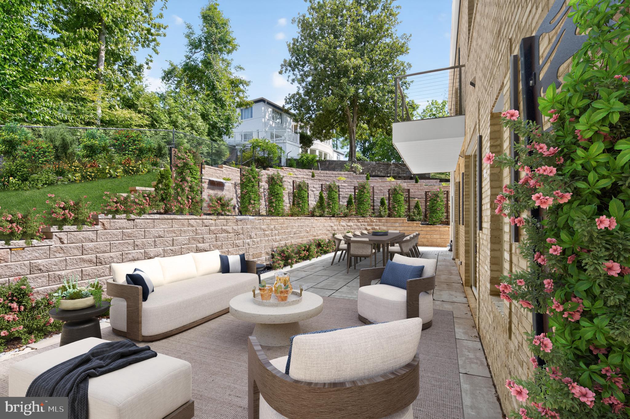 4509 Foxhall Crescent Northwest Washington, DC 20007 - Photo 34 of 39 a view of a patio with couches table and chairs and potted plants