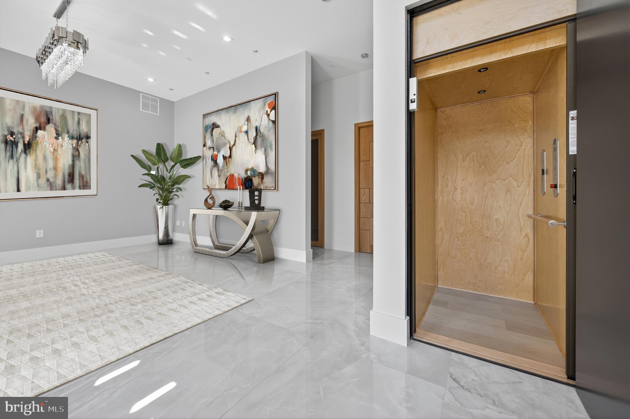 4509 Foxhall Crescent Northwest Washington, DC 20007 - Photo 4 of 39 a view of a hallway with bathroom and shower