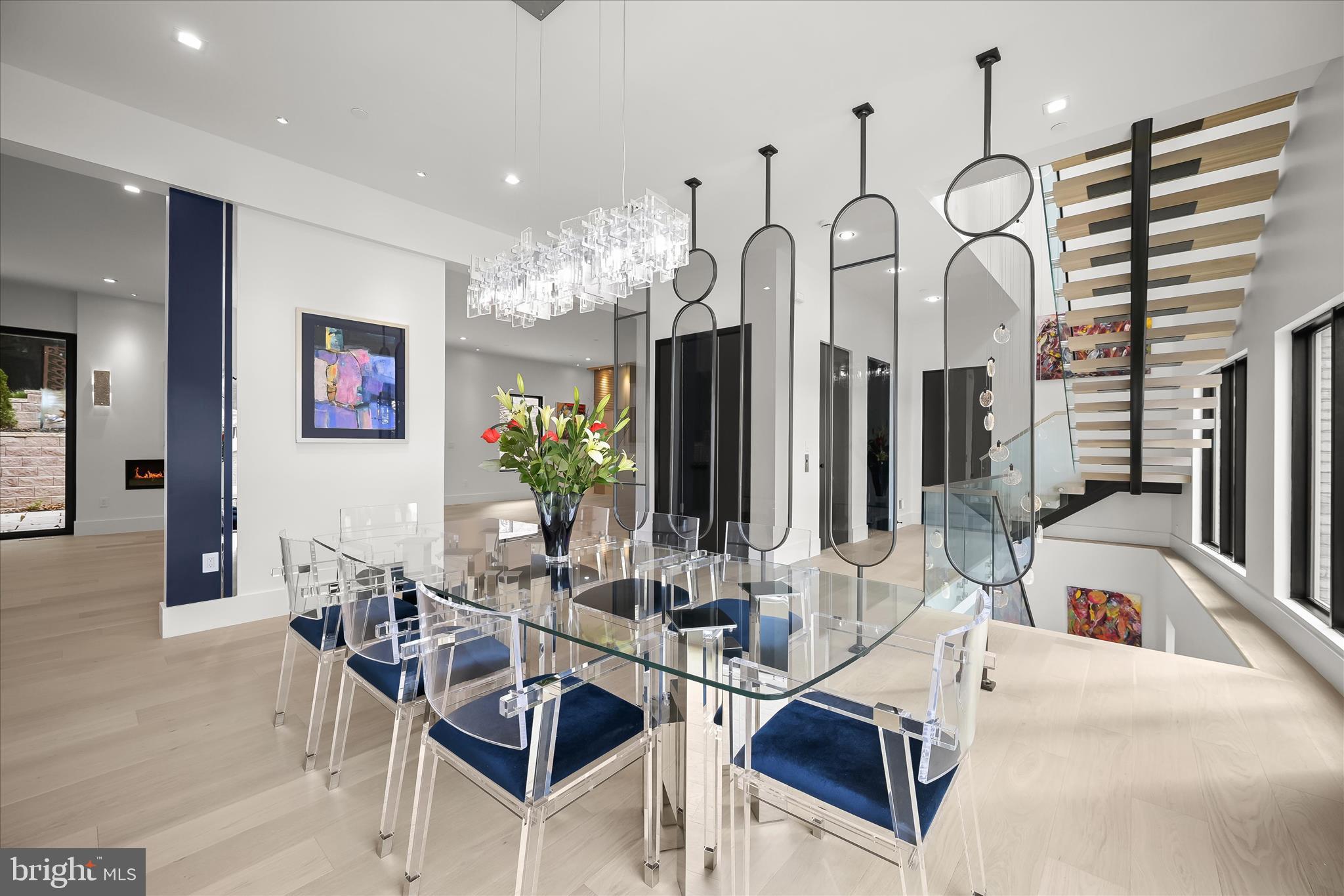 4509 Foxhall Crescent Northwest Washington, DC 20007 - Photo 8 of 39 a view of a dining room with furniture and chandelier