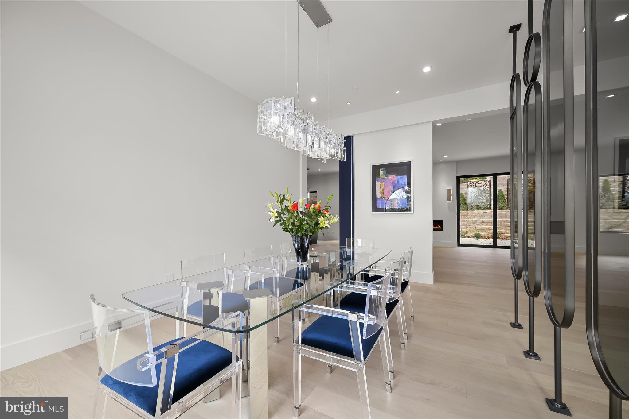 4509 Foxhall Crescent Northwest Washington, DC 20007 - Photo 9 of 39 a living room with furniture and a chandelier