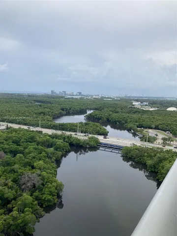an aerial view of a city with houses