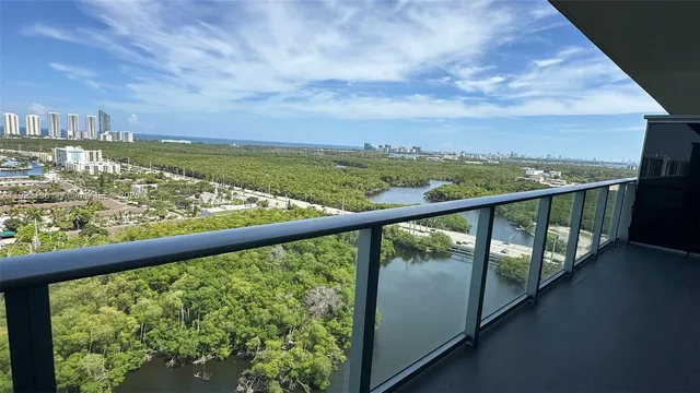 a view of a city skyline from a balcony