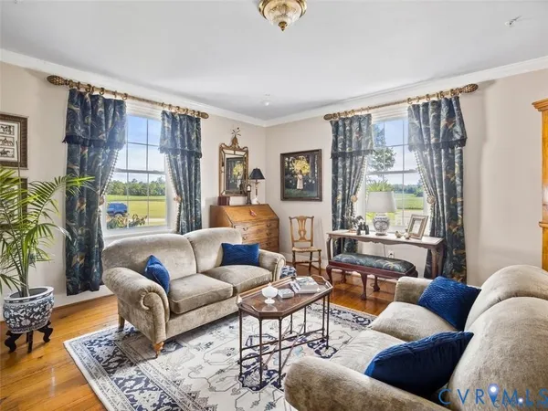 a living room with furniture or couch and a window