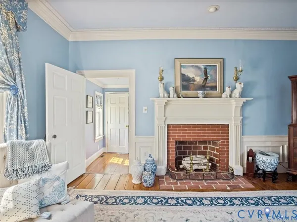 a bedroom with a bed and a mirror