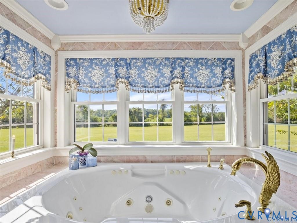 1070 Marlborough Road Bruington, VA 23023 - Photo 22 of 50 a bathroom with a tub and a sink