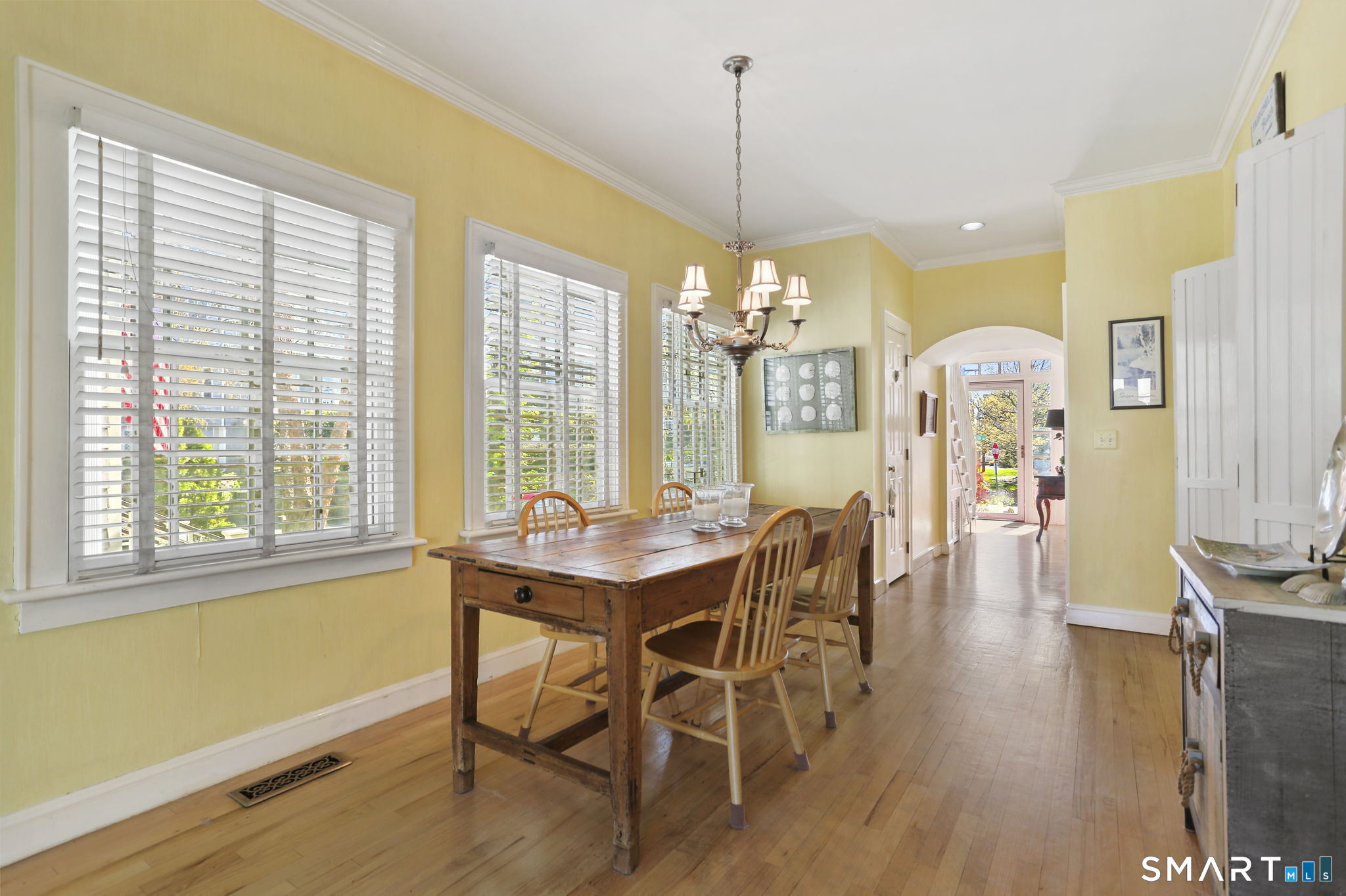 5 Yarmouth Road Norwalk, CT 06853 - Photo 7 of 23 a view of a dining room with furniture window and wooden floor