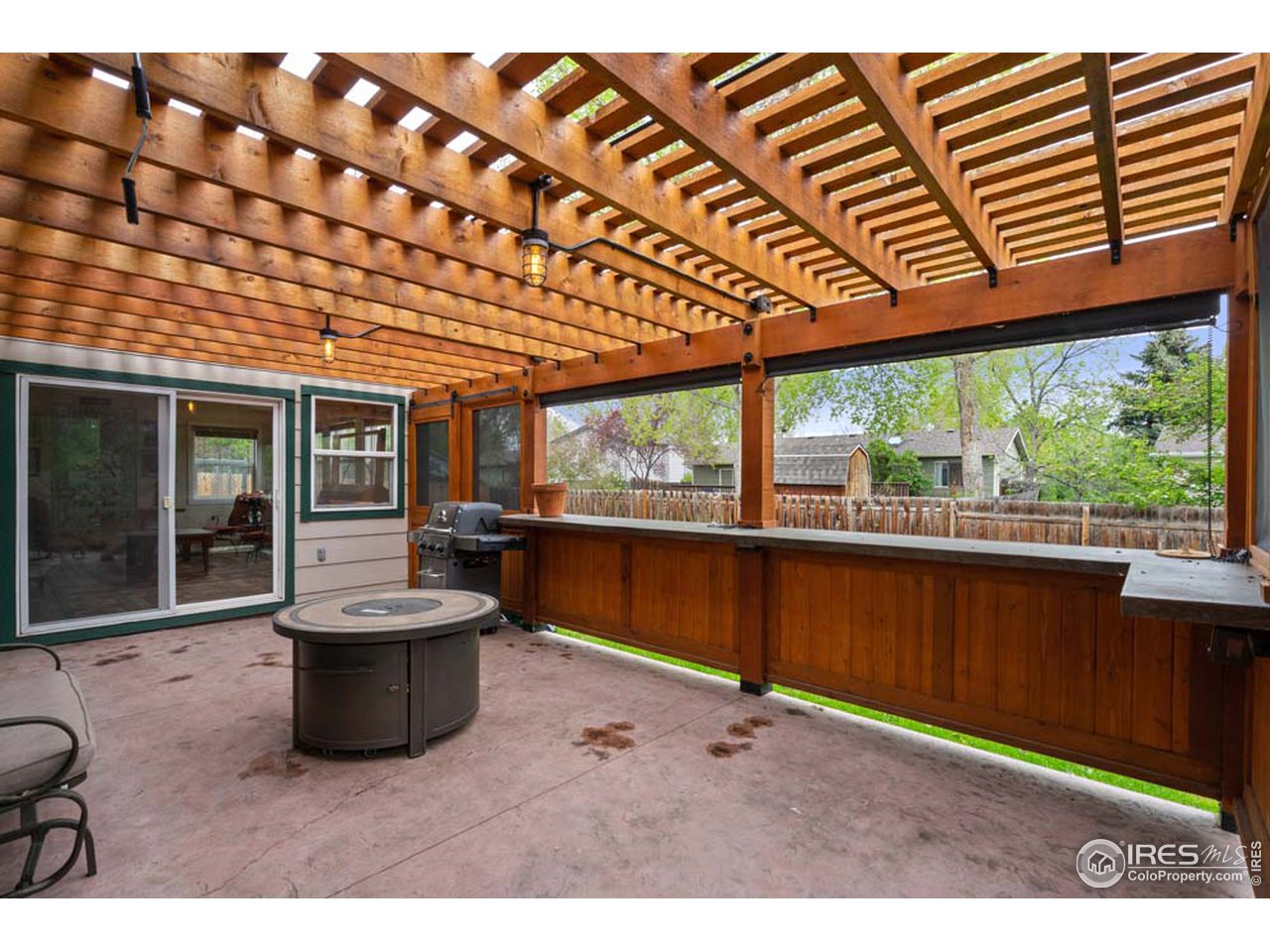 2430 Kodiak Road Fort Collins, CO 80525 - Photo 22 of 25 Pergola covered patio. Has retractable cover!