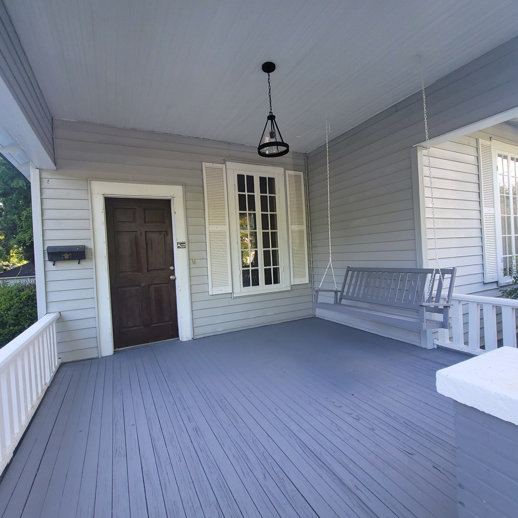 1277 Eberhart Avenue Columbus, GA 31906 - Photo 2 of 17 a view of empty room with wooden floor and fan