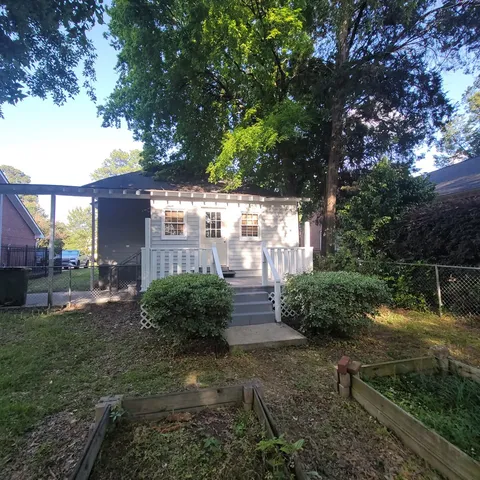 a view of a yard in front of house