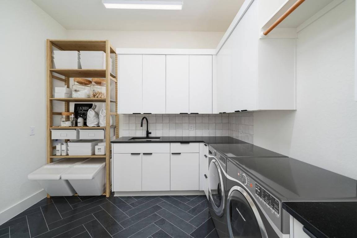 0 Whiterock Kingsland, TX 78639 - Photo 11 of 19 a kitchen with a sink cabinets and appliances