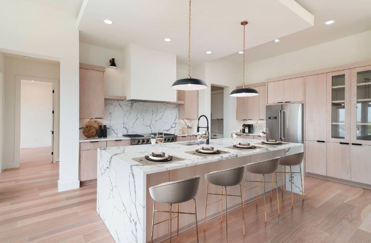 0 Whiterock Kingsland, TX 78639 - Photo 6 of 19 a kitchen with a stove a refrigerator a sink and chairs