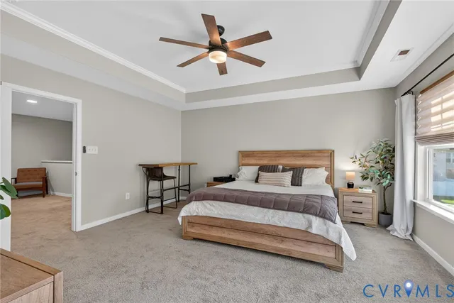 a bedroom with a bed and a table