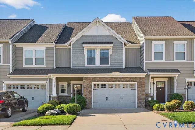 a view of a house with a garden