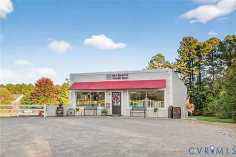 a view of a two chairs in a yard