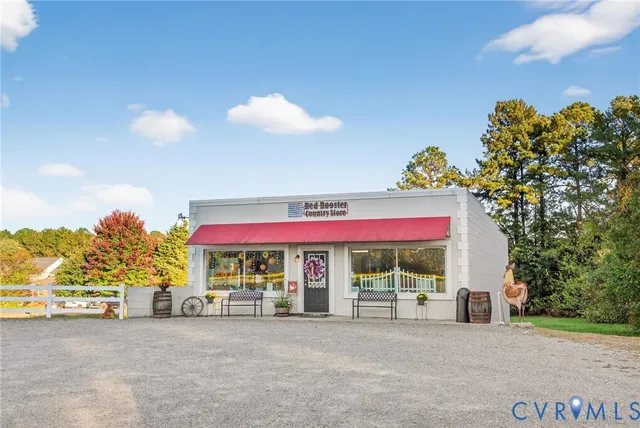 a view of a two chairs in a yard