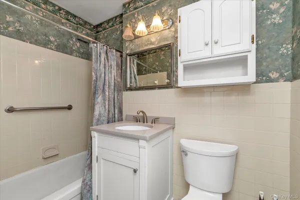 a view of a back yard from a balcony