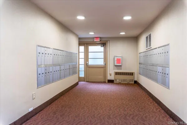 a view of empty room with windows