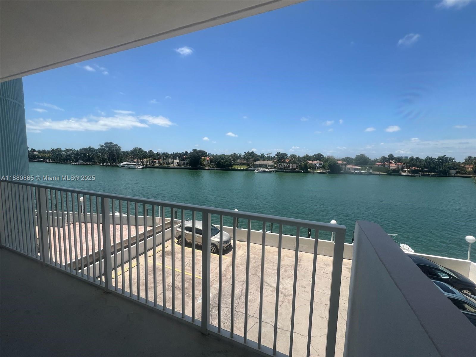 5838 Collins Avenue, Unit 2A Miami Beach, FL 33140 - Photo 14 of 14 a view of city from a lake