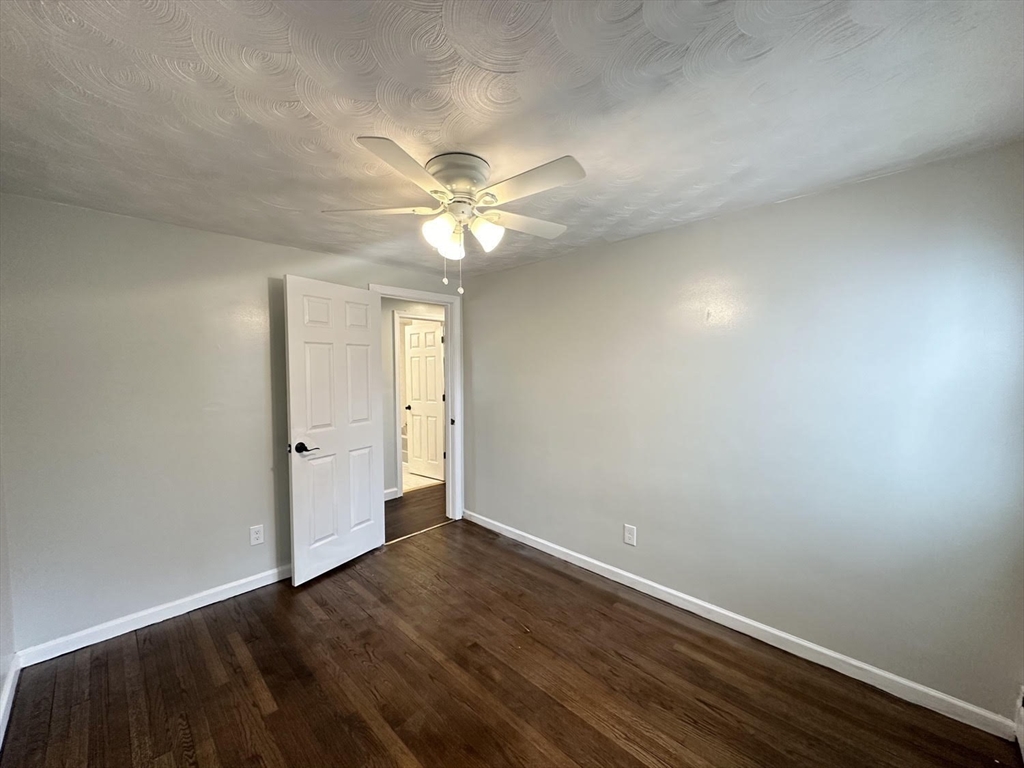 38 Hadley Street Springfield, MA 01118 - Photo 10 of 20 a view of an empty room with a window
