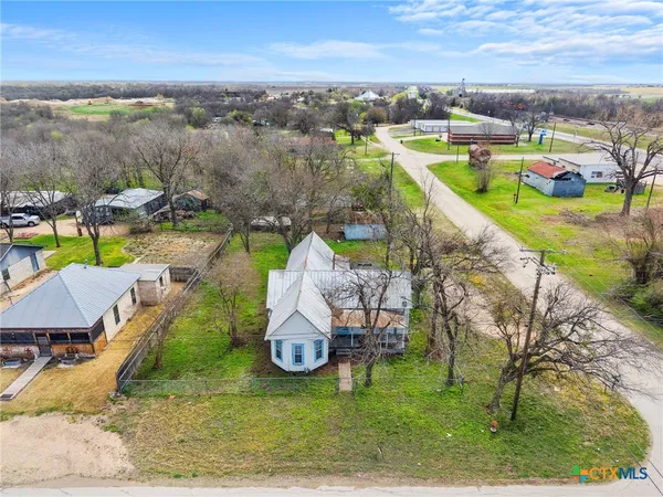 a view of a lake with a houses