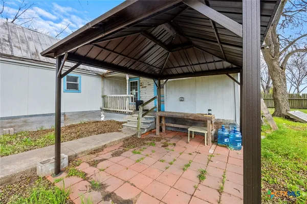 a house with trees in front of it
