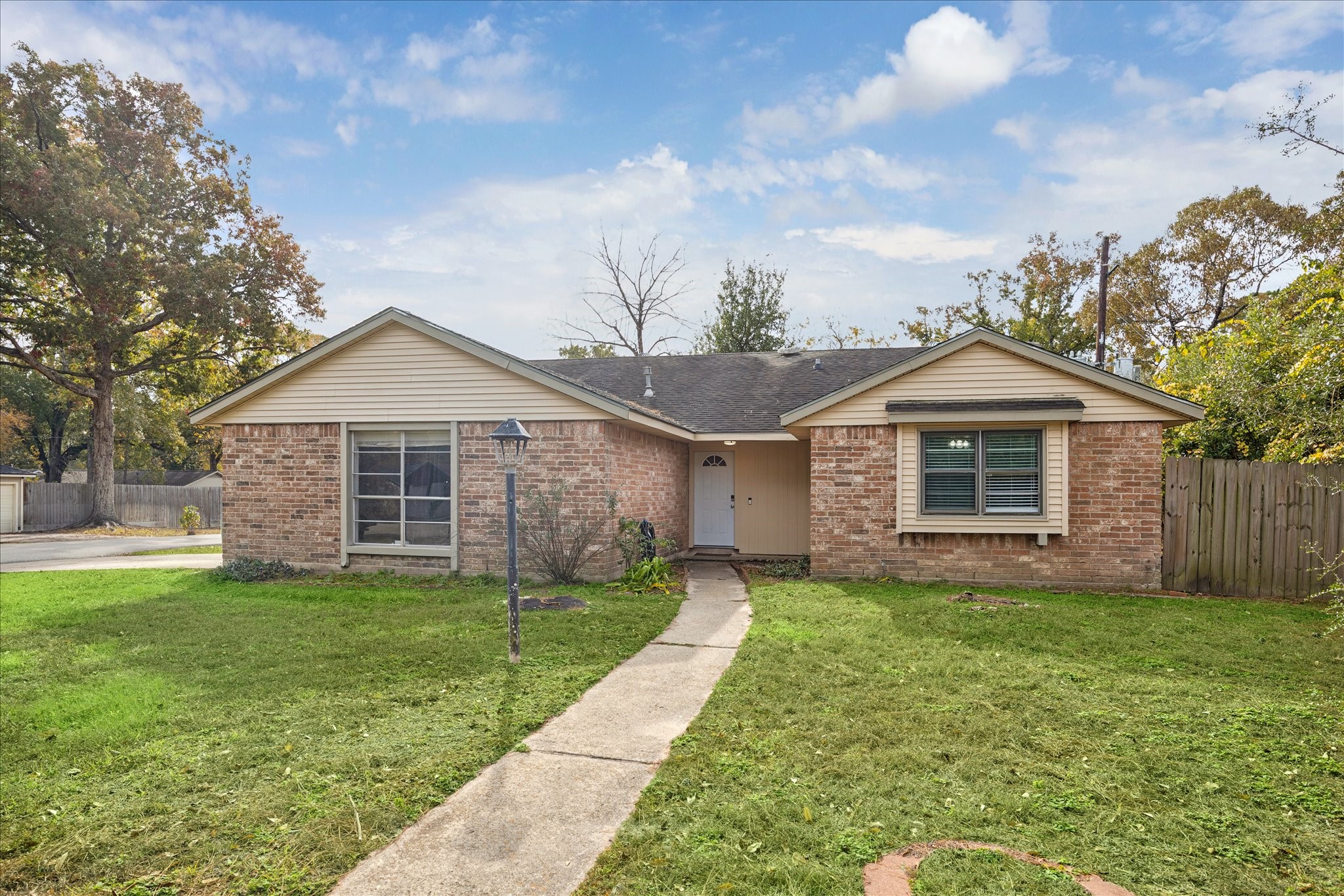 3503 Willie Way Spring, TX 77380 - Photo 1 of 20 a front view of a house with a yard