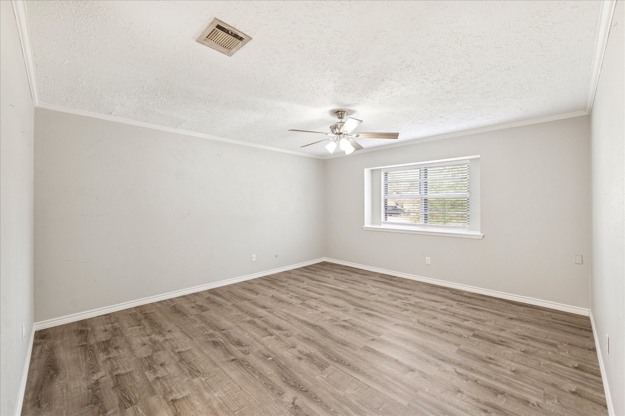 3503 Willie Way Spring, TX 77380 - Photo 17 of 20 wooden floor in an empty room with a window