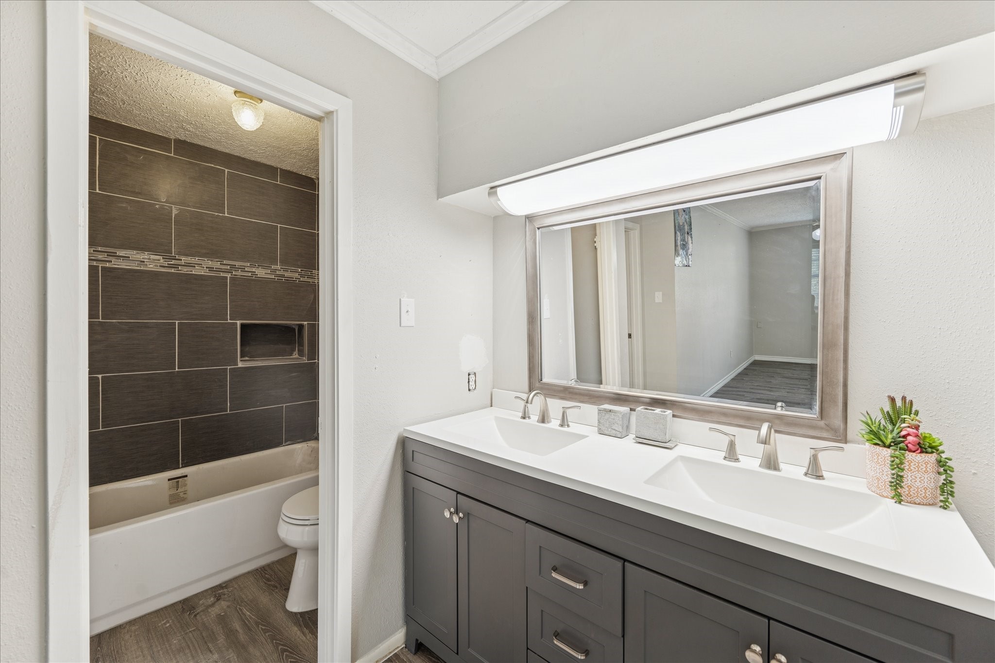3503 Willie Way Spring, TX 77380 - Photo 18 of 20 a bathroom with a bathtub shower sink vanity and toilet