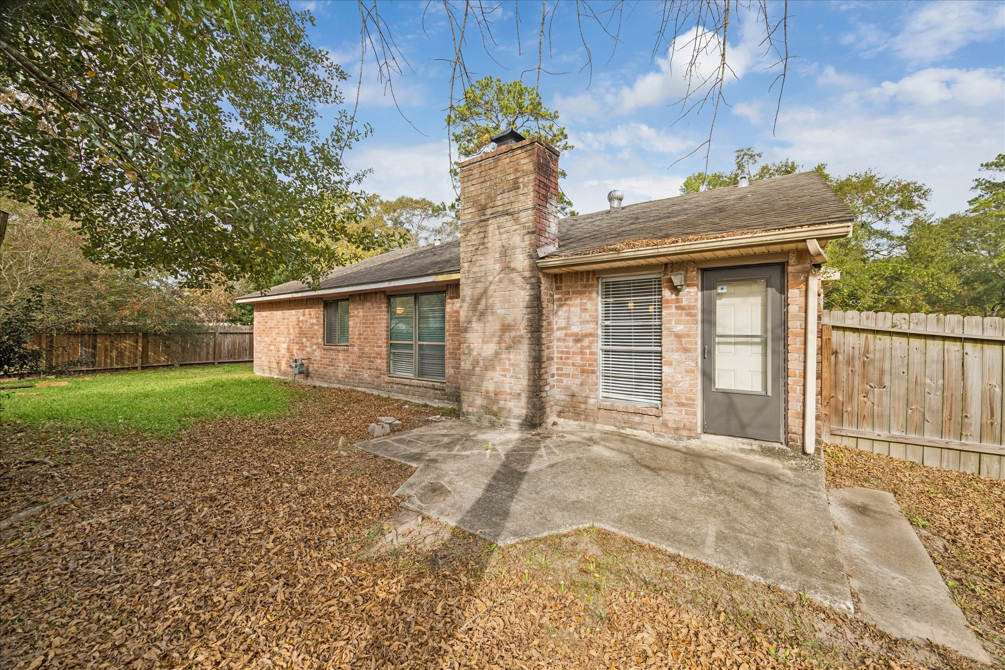 3503 Willie Way Spring, TX 77380 - Photo 19 of 20 a view of a house with a yard and garage