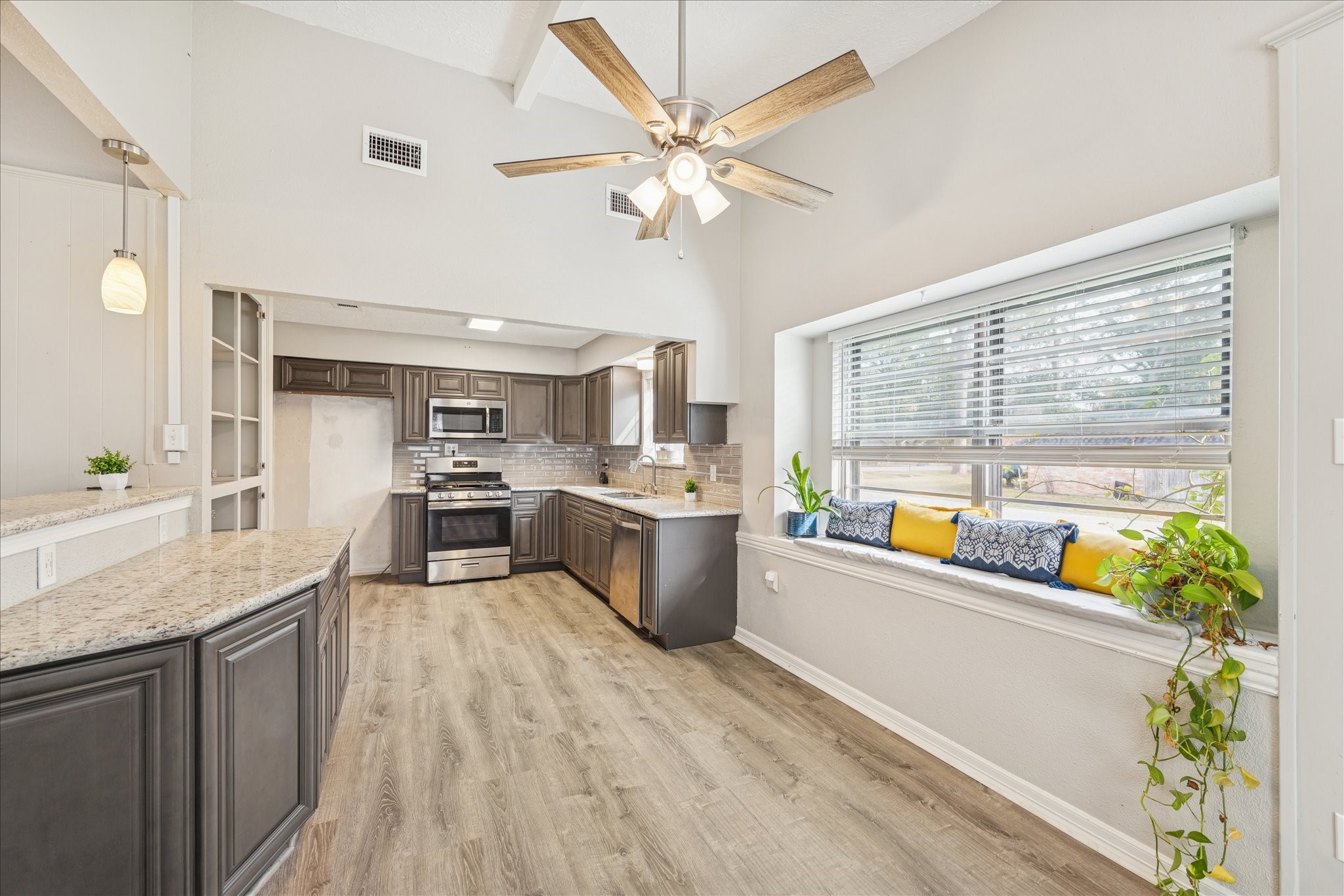 3503 Willie Way Spring, TX 77380 - Photo 10 of 20 a kitchen with stove a sink and cabinets