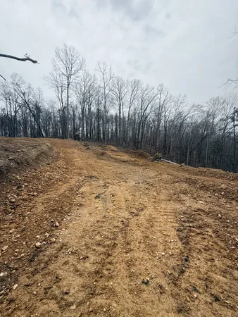 a picture of a bathroom with a picture of a sign with a white wall