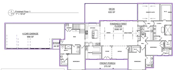 an aerial view of a house with a garden and trees