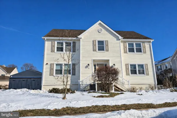a view of a house with snow