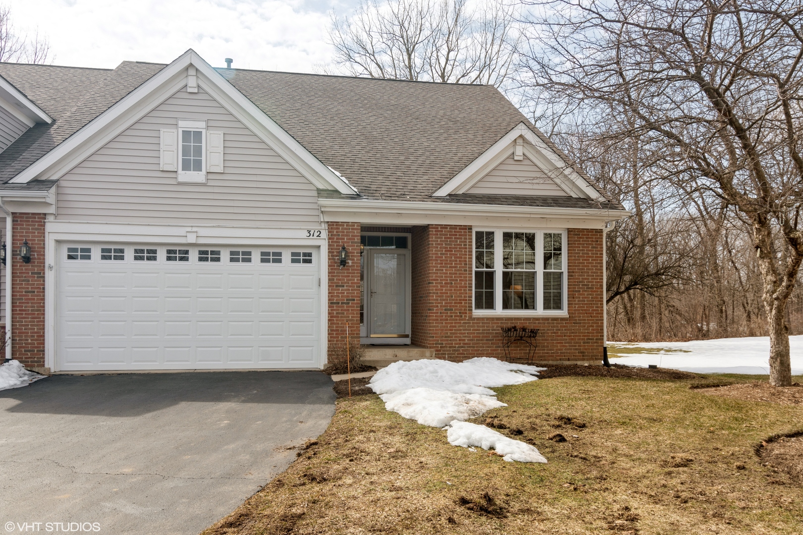 312 Quarry Ridge Circle Sugar Grove, IL 60554 - Photo 1 of 23 a view of a house with a yard