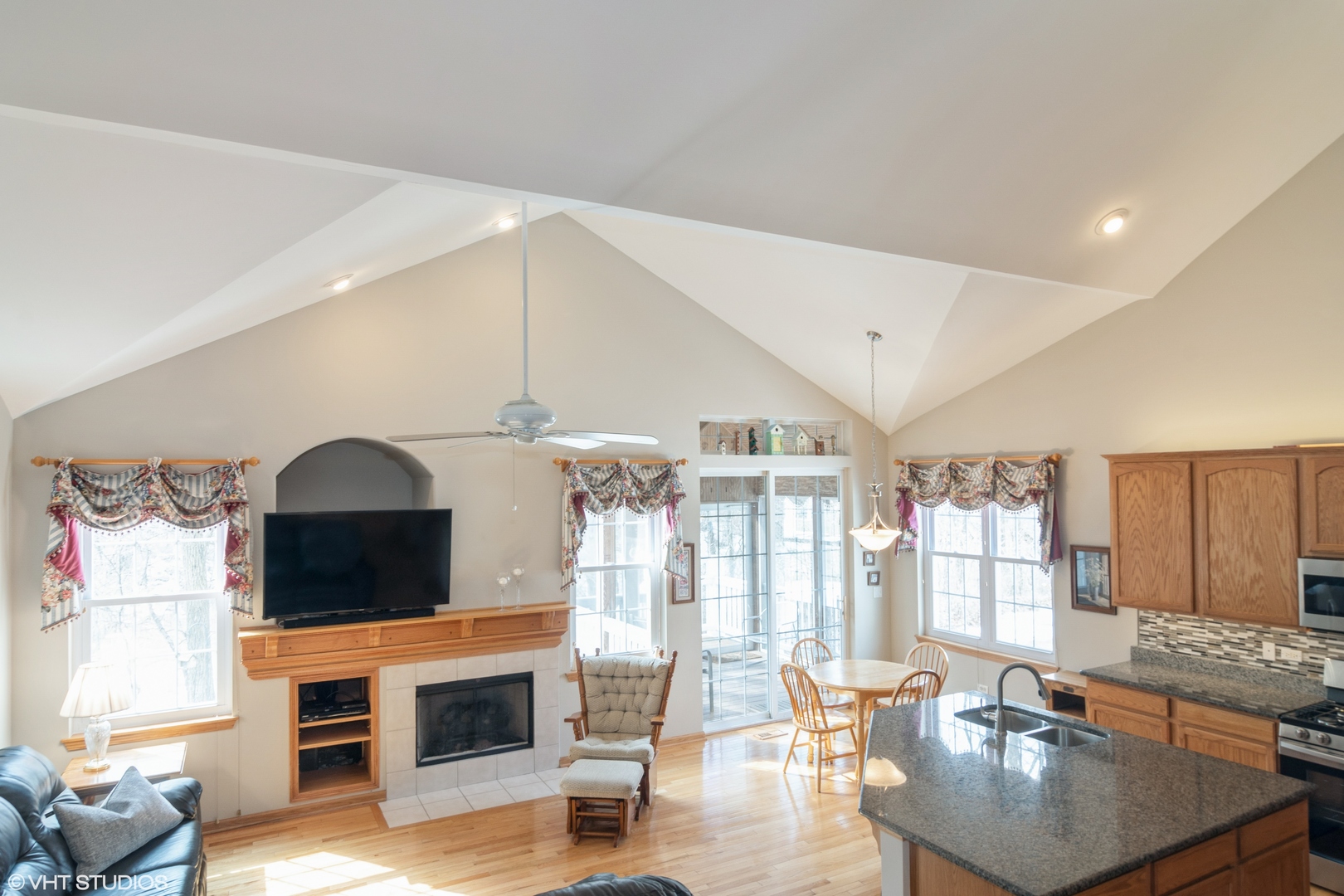 312 Quarry Ridge Circle Sugar Grove, IL 60554 - Photo 8 of 23 a living room with furniture and a fireplace