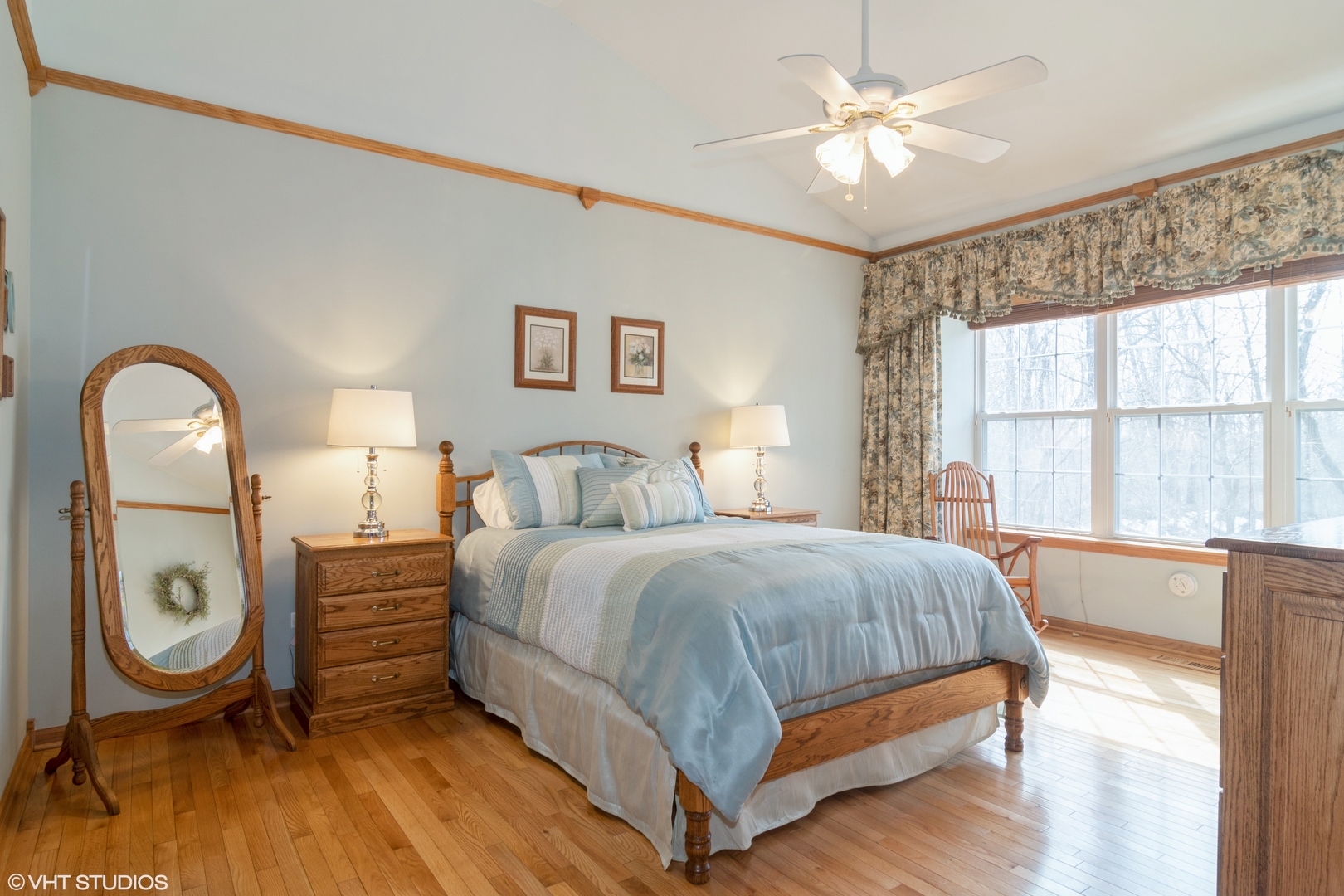 312 Quarry Ridge Circle Sugar Grove, IL 60554 - Photo 9 of 23 a bedroom with a bed a dresser and a large window