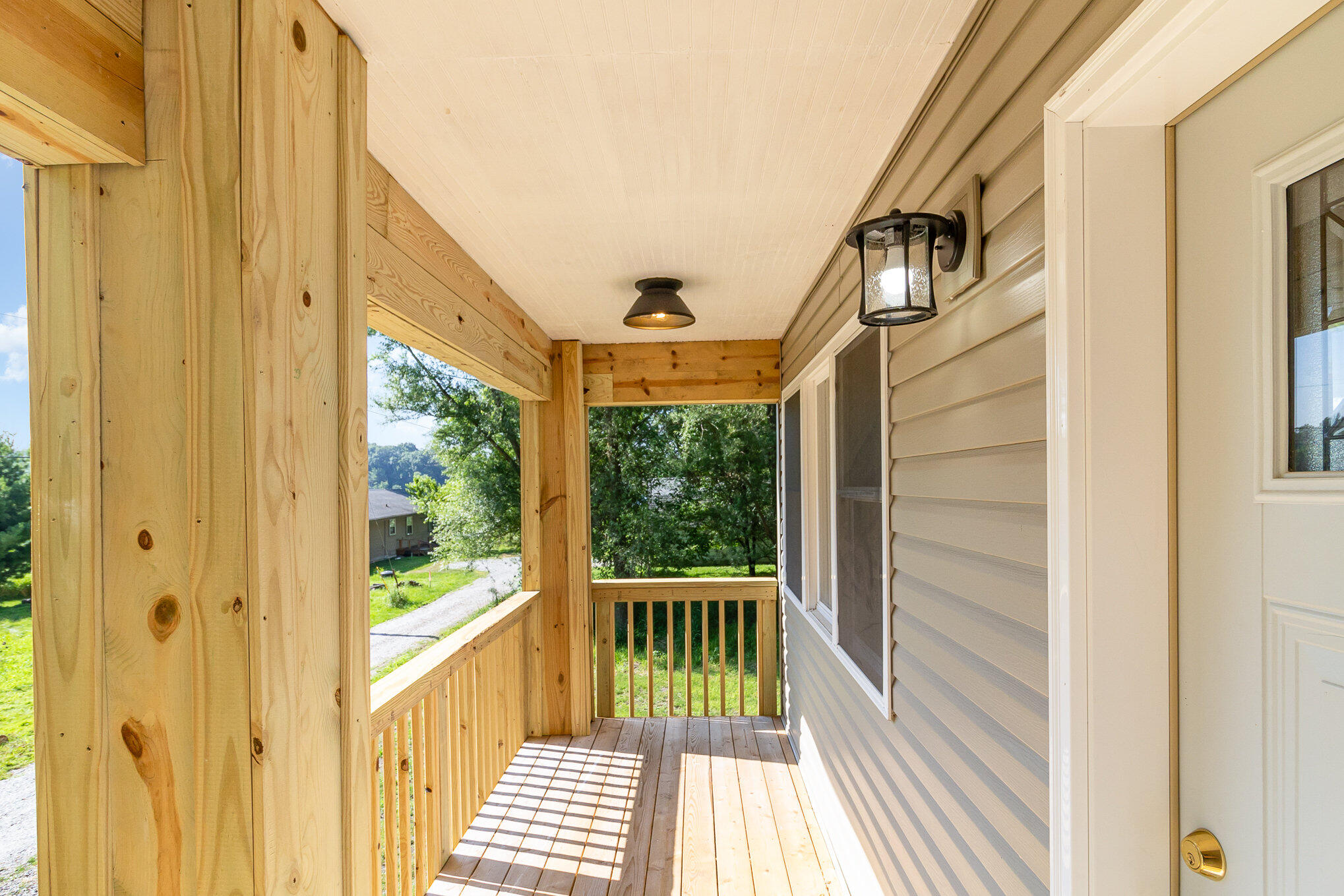 44 Vick Tree Lane Hebron, IN 46341 - Photo 5 of 29 a view of balcony with wooden floor