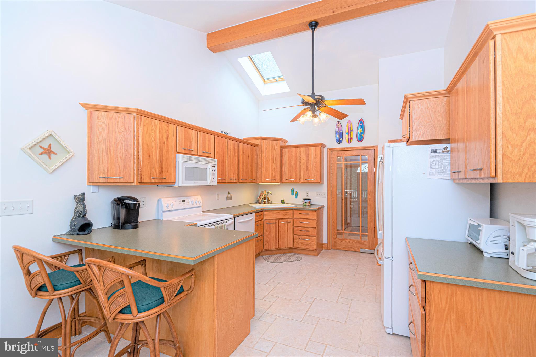9434 Croppers Island Road Newark, MD 21841 - Photo 23 of 48 a kitchen with a sink cabinets and window